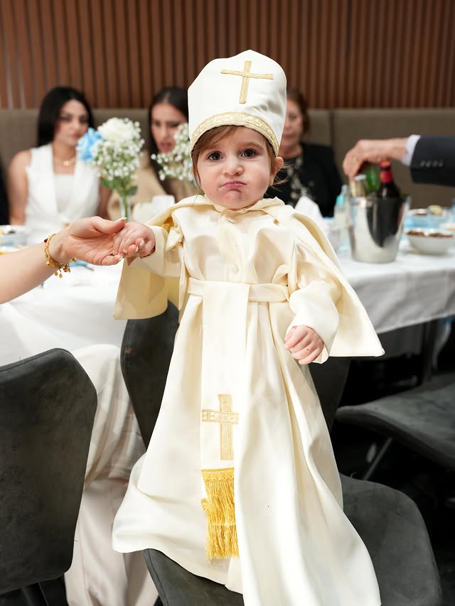 Child in christening robes